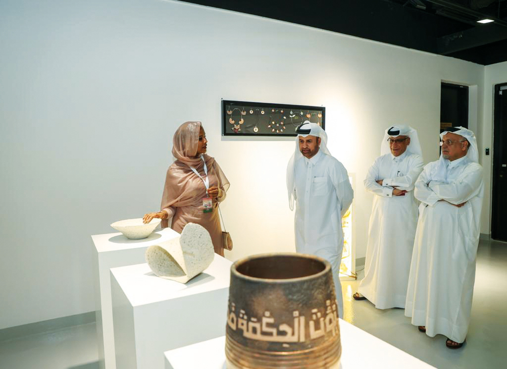  Prof Dr. Khalid bin Ibrahim Al Sulaiti, Director General of the Cultural Village Foundation, Katara, along with other officials during an exhibition. 