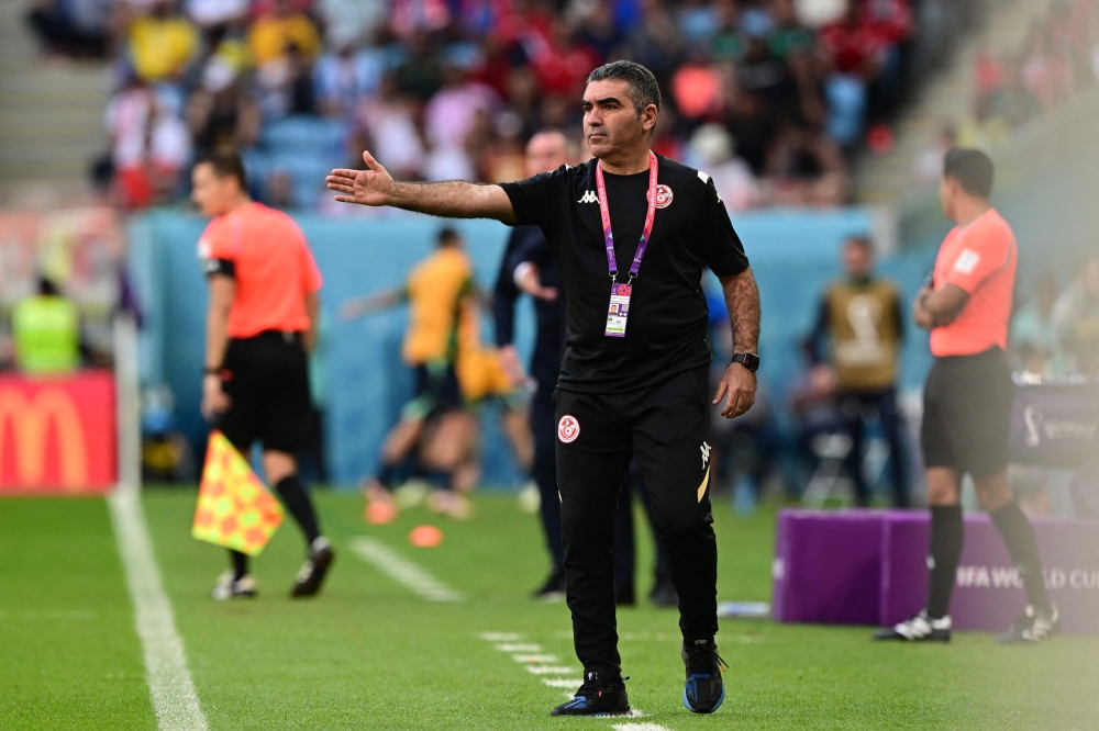 Tunisia's coach Jalel Kadri gestures on the touchline during the Qatar 2022 World Cup Group D football match between Tunisia and Australia at the Al-Janoub Stadium in Al-Wakrah, south of Doha on November 26, 2022. (Photo by Miguel MEDINA / AFP)