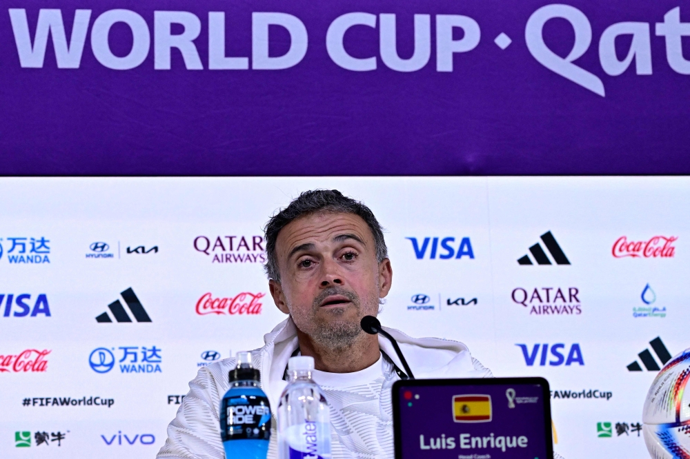 Spain's coach Luis Enrique attends a press conference at the Qatar National Convention Center (QNCC) in Doha on November 26, 2022, on the eve of the Qatar 2022 World Cup football match between Spain and Germany. (Photo by JAVIER SORIANO / AFP)
 