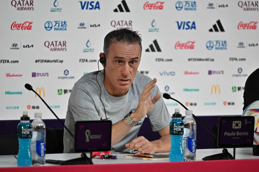 South Korea's Portuguese coach Paulo Bento addresses a press conference at the Qatar National Convention Center (QNCC) in Doha on November 27, 2022, on the eve of the Qatar 2022 World Cup football match between South Korea and Ghana. (Photo by JUNG Yeon-je / AFP)