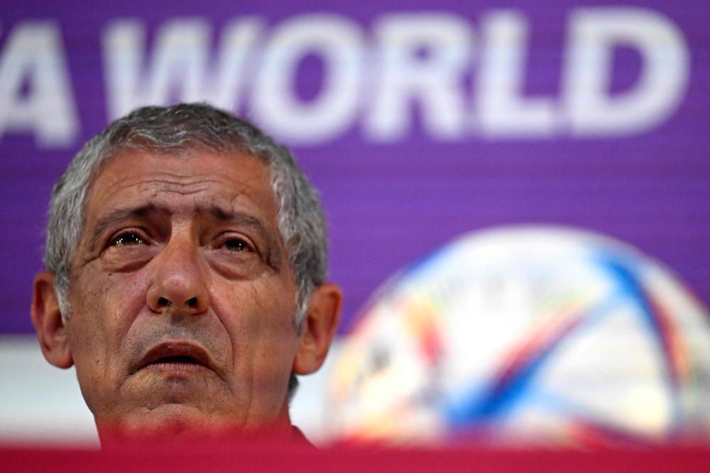 Portugal's coach Fernando Santos attends a press conference at the Qatar National Convention Center (QNCC) in Doha on November 27, 2022, on the eve of the Qatar 2022 World Cup football match between Portugal and Uruguay. (Photo by PATRICIA DE MELO MOREIRA / AFP)