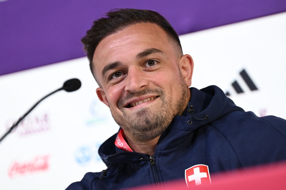 Switzerland's midfielder #23 Xherdan Shaqiri addresses a press conference at the Qatar National Convention Center (QNCC) in Doha on November 27, 2022, on the eve of the Qatar 2022 World Cup football match between Brazil and Switzerland. (Photo by FABRICE COFFRINI / AFP)