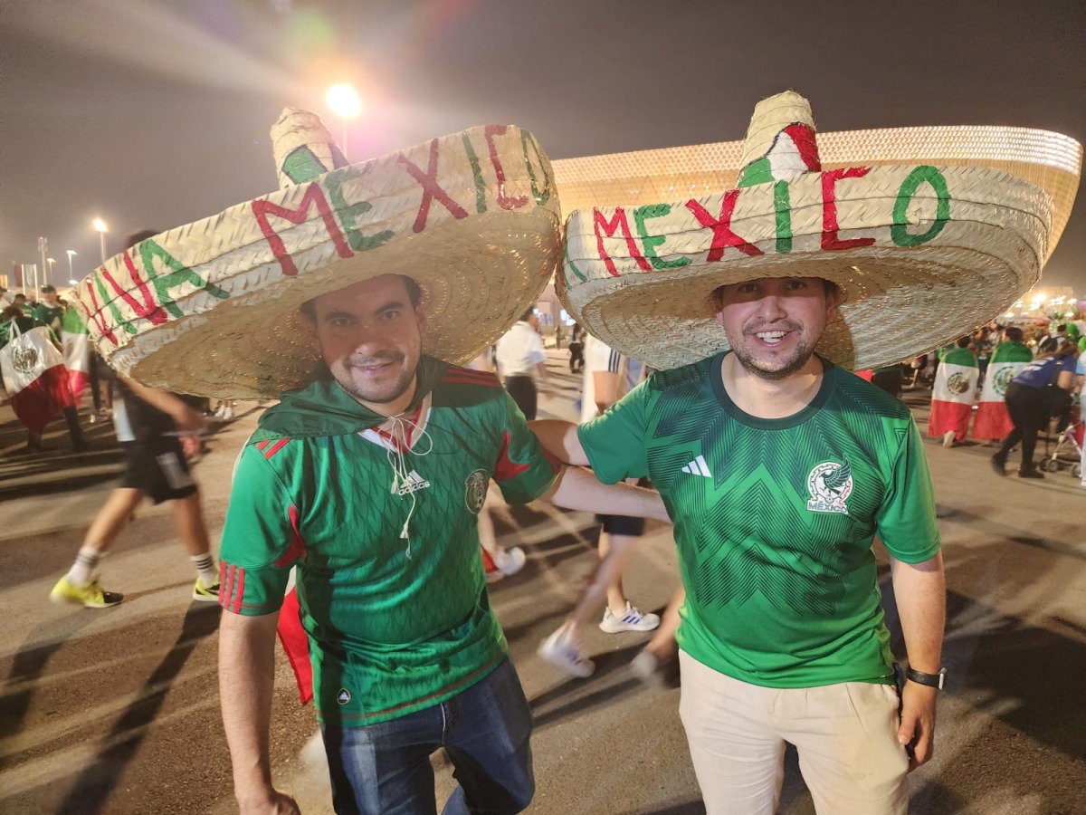 Mexico fans stand outside Lusail Stadium. Photo by Abdul Basit/ The Peninsula