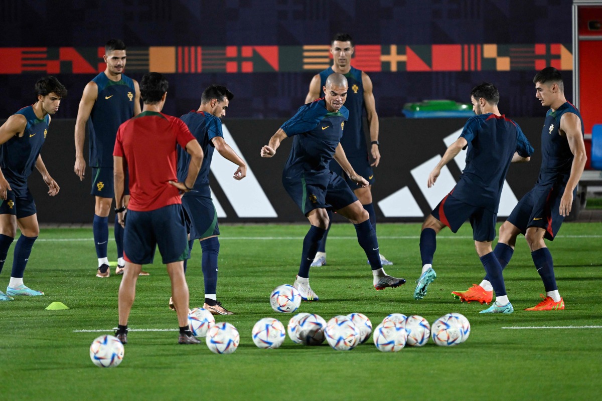 Portugal’s players during a team training session at Al Shahania SC yesterday. 