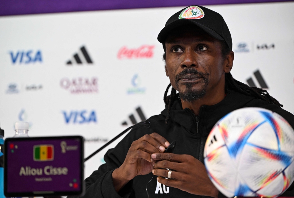 Senegal's coach Aliou Cisse gives a press conference at the Qatar National Convention Center (QNCC) in Doha on November 28, 2022, on the eve of the Qatar 2022 World Cup football match between Ecuador and Senegal. (Photo by OZAN KOSE / AFP)