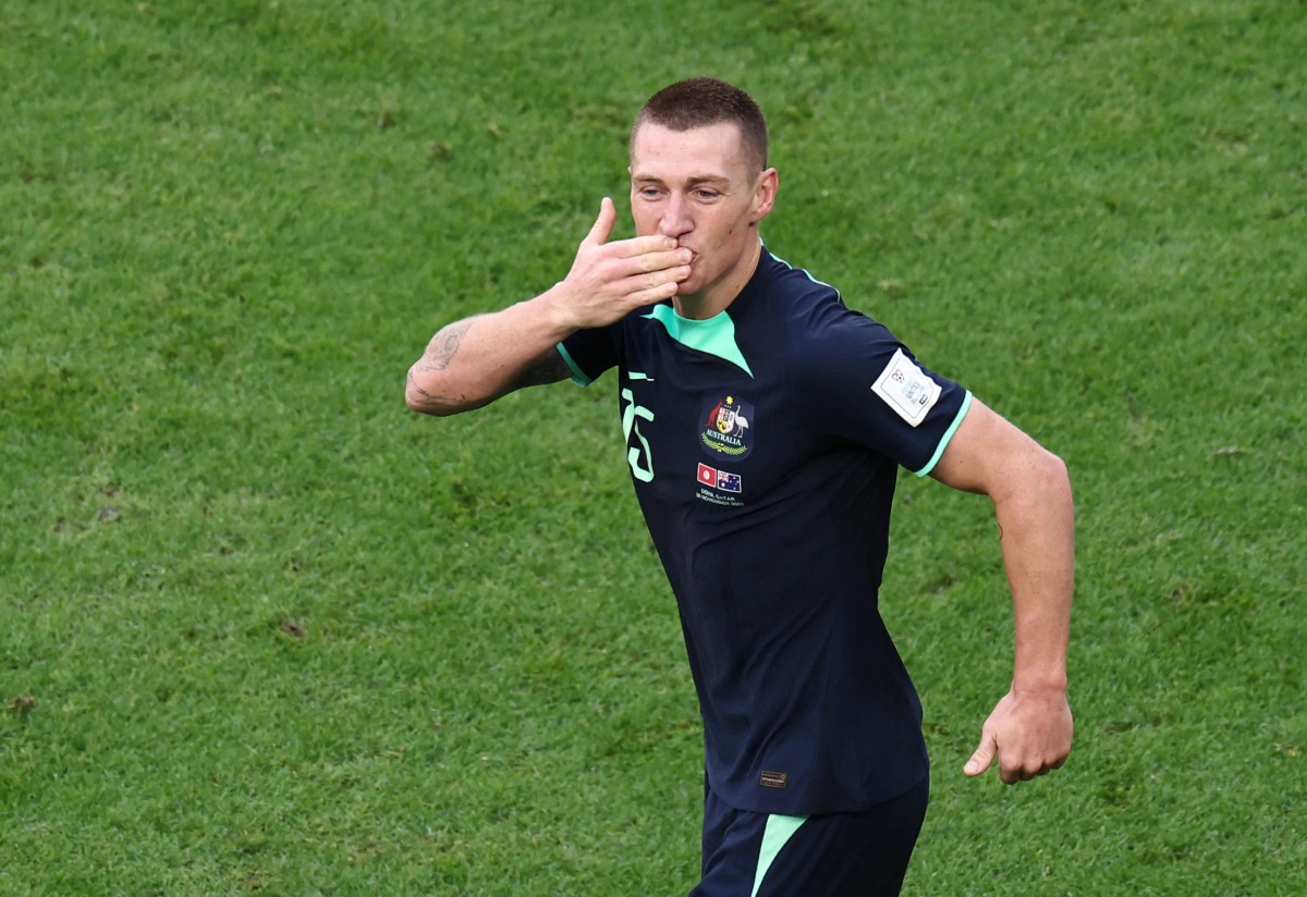 Australia’s Mitchell Duke celebrates scoring their first goal