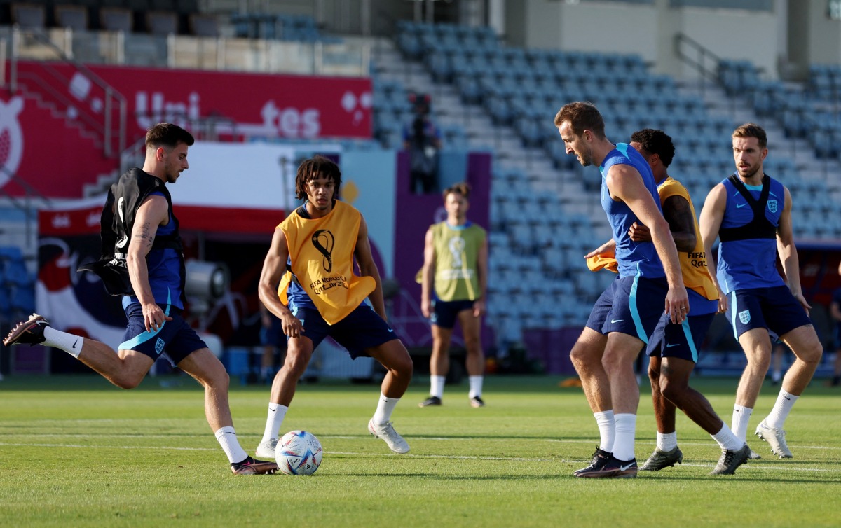 England’s Harry Kane, Trent Alexander-Arnold and Mason Mount train with teammates. REUTERS