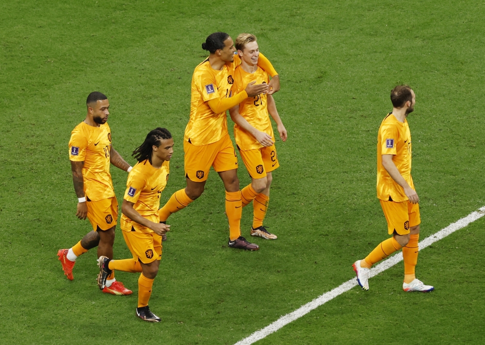 Netherlands' Frenkie de Jong celebrates scoring their second goal with teammate Virgil van Dijk during the FIFA World Cup Qatar 2022 Group A match against Qatar at the Al Bayt Stadium in Al Khor on November 29, 2022.  REUTERS/Albert Gea