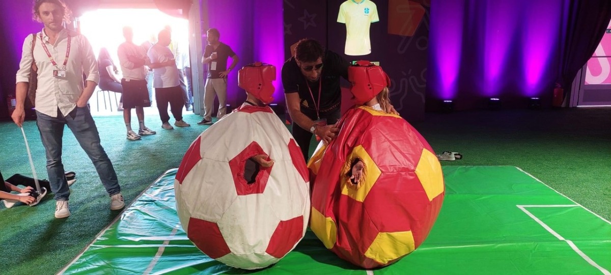 Among the activities at the Hayya Fan Zone is this sumo-inspired wrestling where players are dressed like football. PIC: Jusztina Haas