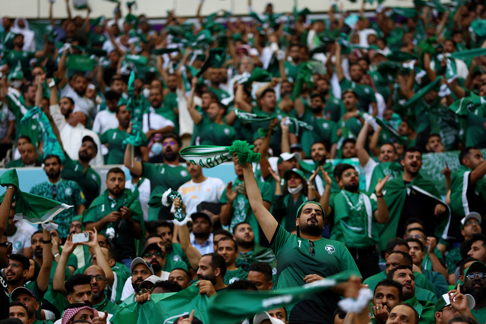 Saudi Arabia fans celebrate their team's victory in the FIFA World Cup Qatar 2022 Group C match against Argentina at the Lusail Stadium on November 22, 2022. (REUTERS/Hannah Mckay)