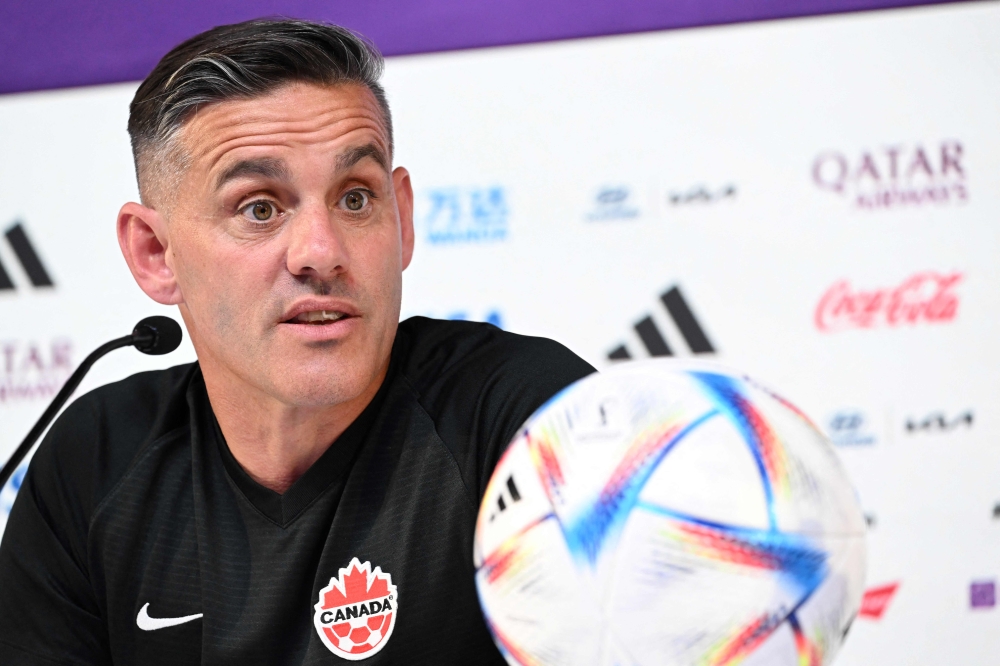 Canada's English coach John Herdman attends a press conference at the Qatar National Convention Center (QNCC) in Doha on November 30, 2022, on the eve of the Qatar 2022 World Cup football match between Canada and Morocco. (Photo by Patrick T. Fallon / AFP)