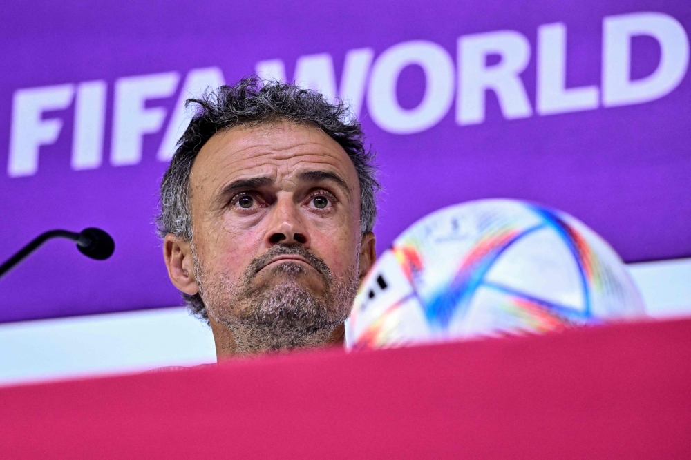 Spain's coach Luis Enrique attends a press conference at the Qatar National Convention Center (QNCC) in Doha on November 30, 2022. (AFP/Javier Soriano)