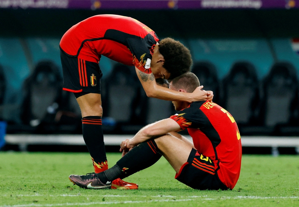 Belgium's Axel Witsel and Jan Vertonghen look dejected after the FIFA World Cup Qatar 2022 Group F match against Croatia, as Belgium are eliminated from tournament, at the Ahmad Bin Ali Stadium, Al Rayyan, Qatar, on December 1, 2022.  REUTERS/Piroschka Van De Wouw