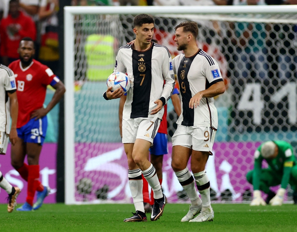 Germany's Kai Havertz celebrates scoring their third goal against Costa Rica with Niclas Fullkrug during the FIFA World Cup Qatar 2022 Group E match at the Al Bayt Stadium, Al Khor, Qatar, on December 1, 2022. EUTERS/Kai Pfaffenbach