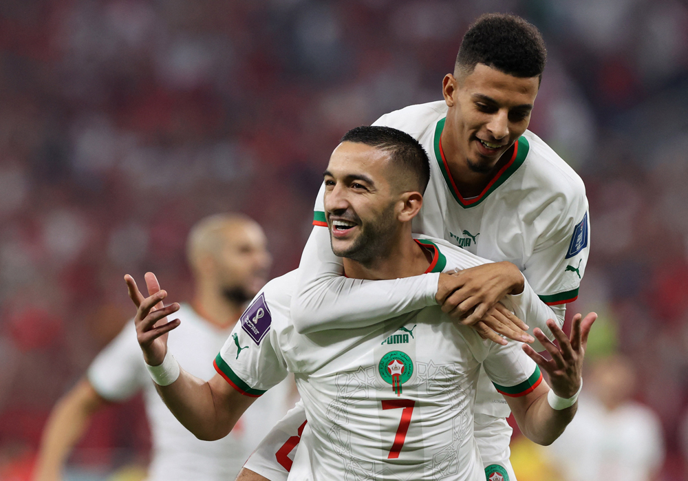 Morocco’s Hakim Ziyech (front) celebrates scoring their first goal with Azzedine Ounahi. PICTURES: REUTERS

