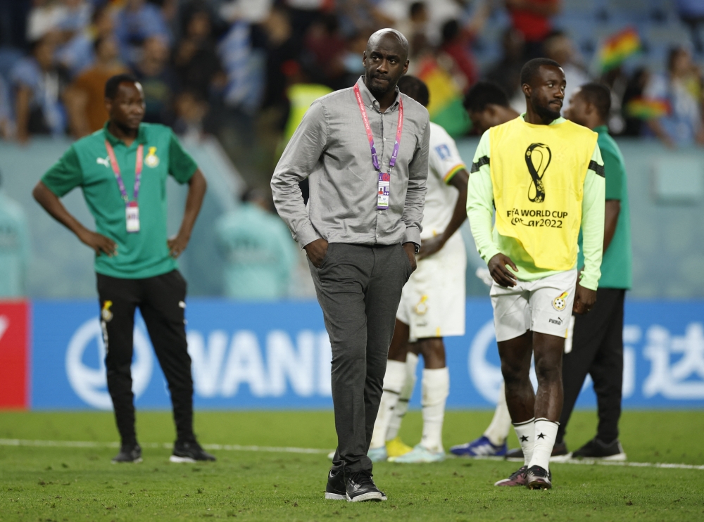 Ghana coach Otto Addo looks dejected after being eliminated from the World Cup during the final Group H match between Ghana and Uruguay at the Al Janoub Stadium on December 2, 2022. (REUTERS/John Sibley)