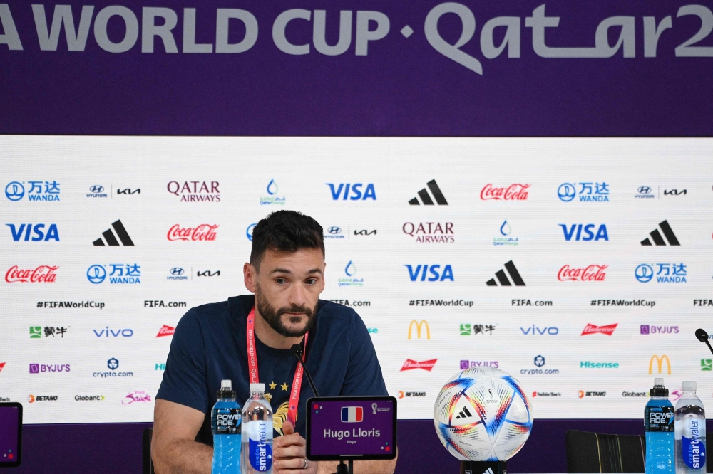 France's goalkeeper Hugo Lloris attends a press conference at the Qatar National Convention Center (QNCC) in Doha on December 3, 2022. (Photo by FRANCK FIFE / AFP)