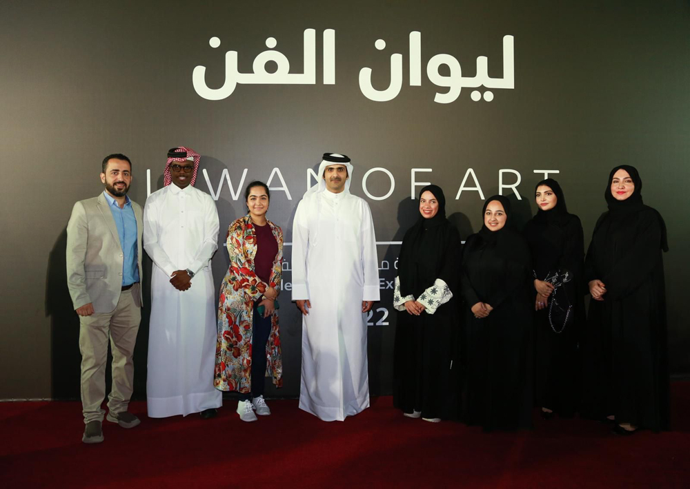 Minister of Culture H E Sheikh Abdulrahman bin Hamad Al Thani with artists at ‘Liwan Art’ exhibition being held as part of National Day celebrations at Darb Al Saai.  