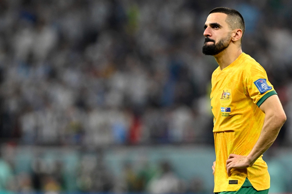 Australia's defender Aziz Behich reacts after his team lost the Qatar 2022 World Cup round of 16 football match between Argentina and Australia at the Ahmad Bin Ali Stadium in Al-Rayyan, west of Doha on December 3, 2022. (Photo by Alfredo ESTRELLA / AFP)