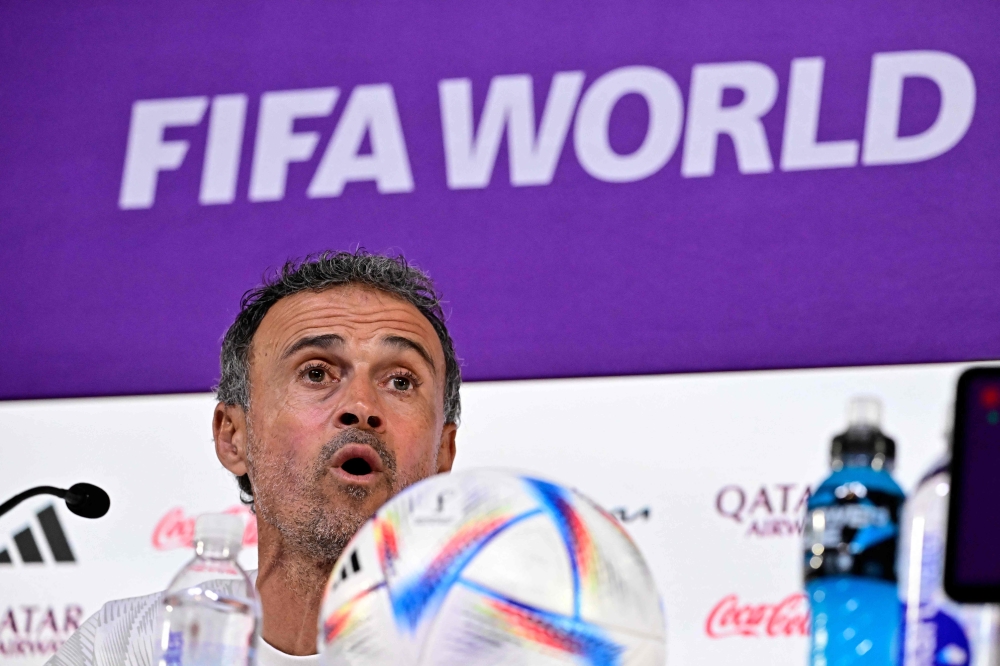 Spain's coach Luis Enrique attends a press conference at the Qatar National Convention Center (QNCC) in Doha on December 5, 2022, on the eve of the Qatar 2022 World Cup Round of 16 football match between Morocco and Spain. (Photo by JAVIER SORIANO / AFP)