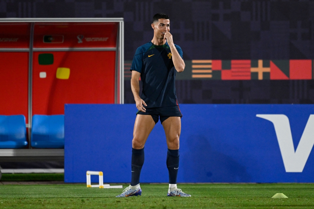 Portugal's Cristiano Ronaldo attends a training session at the Al Shahaniya SC training site, northwest of Doha on December 5, 2022, on the eve of the Qatar 2022 World Cup Round of 16 football match between Portugal and Switzerland. (AFP / Patricia de Melo Moreira)