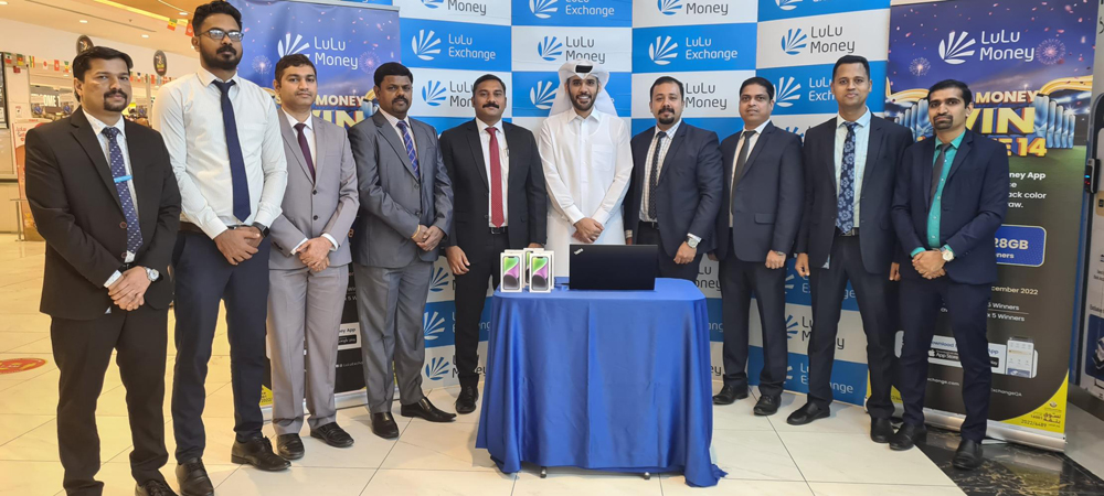 Hamad Al Mohannadi from the Ministry of Commerce and Industry and Lulu Exchange officials during the first lucky draw of the ongoing campaign at the D-Ring Road Branch.