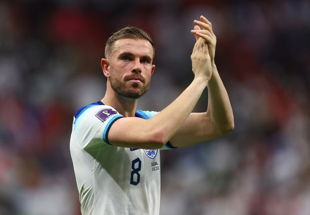 December 4, 2022 England's Jordan Henderson applauds fans after qualifying for the quarter finals REUTERS/Kai Pfaffenbach