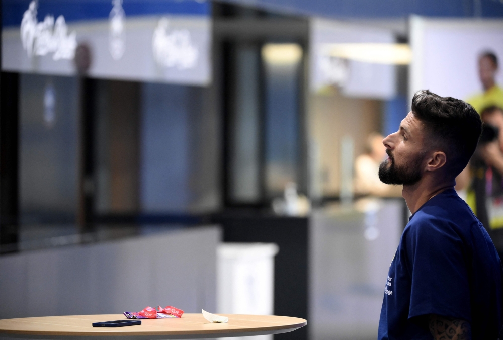 France's forward Olivier Giroud waits ahead of a press conference at the Jassim-bin-Hamad Stadium in Doha, on December 6, 2022, in the build-up to the Qatar 2022 World Cup quarter final football match between France and England. (Photo by FRANCK FIFE / AFP)