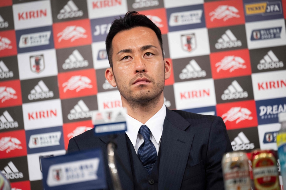 Japan's player Maya Yoshida attends a press conference in Narita, Chiba prefecture in Narita on December 7, 2022, following their loss in the second round of the 2022 World Cup in Qatar. (Photo by Yuichi YAMAZAKI / AFP)