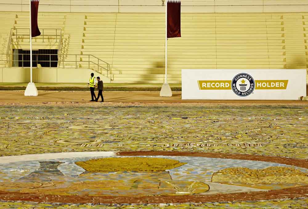 The largest sports and cultural painting in the world by Artist Emad Salehi is displayed on the ground of Qatar University Stadium during the inauguration Reuters/Hamad I Mohammed