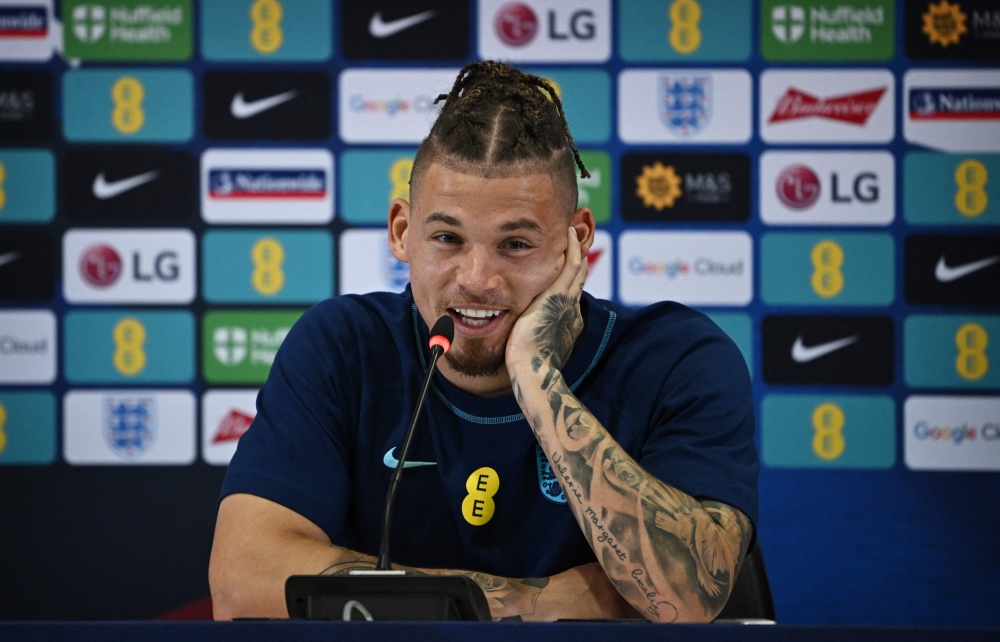 England's Kalvin Phillips speaks during a press conference at the Al Wakrah Stadium in Al Wakrah, Qatar, on December 8, 2022, in the build-up to the Qatar 2022 World Cup quarter-final football match between France and England. (Photo by Paul ELLIS / AFP)