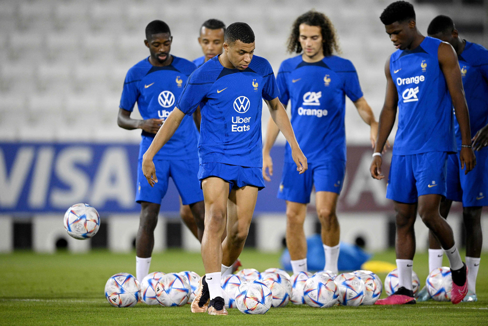 French players take part in a training session at Al Sadd SC yesterday. AFP