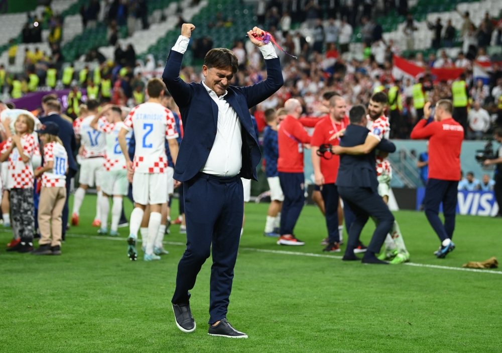 Croatia coach Zlatko Dalic celebrates after the penalty shootout as Croatia progress to the semi finals during the Qatar World Cup quarter-final match between Croatia and Brazil at the Education City Stadium on December 9, 2022. (REUTERS/Annegret Hilse)