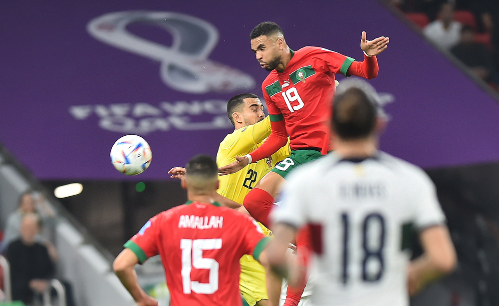 Morocco's Youssef En-Nesyri heads the ball to score against Portugal during their quarter-final match at Al Thumama Stadium, yesterday. Pic: Abdul Basit