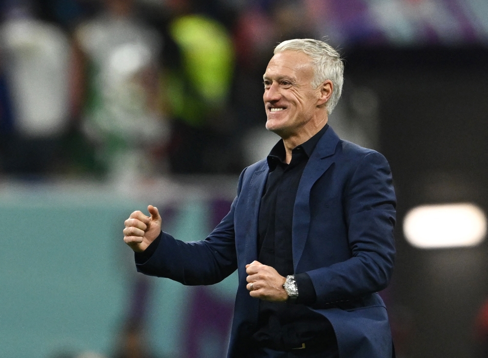 France coach Didier Deschamps celebrates after the FIFA World Cup Qatar 2022 quarter-final match against England as France progress to the semi-finals at the Al Bayt Stadium in Al Khor on December 10, 2022.  REUTERS/Dylan Martinez 