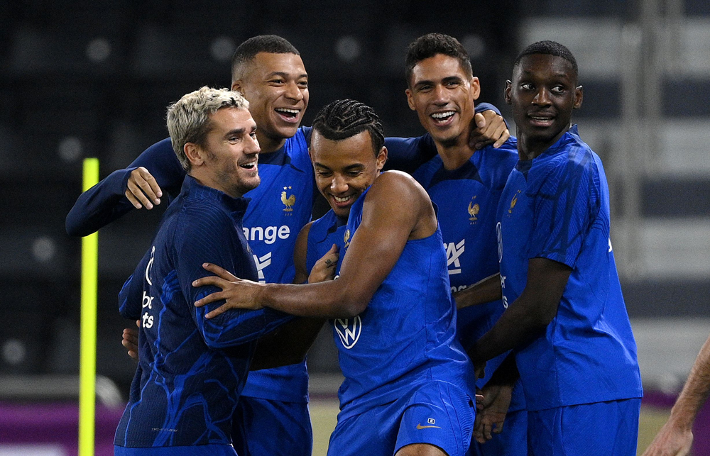 (From left) France’s players Antoine Griezmann, Kylian Mbappe, Jules Kounde, Raphael Varane and Randal Kolo Muani during a training session at the Jassim Bin Hamad Stadium, yesterday. AFP