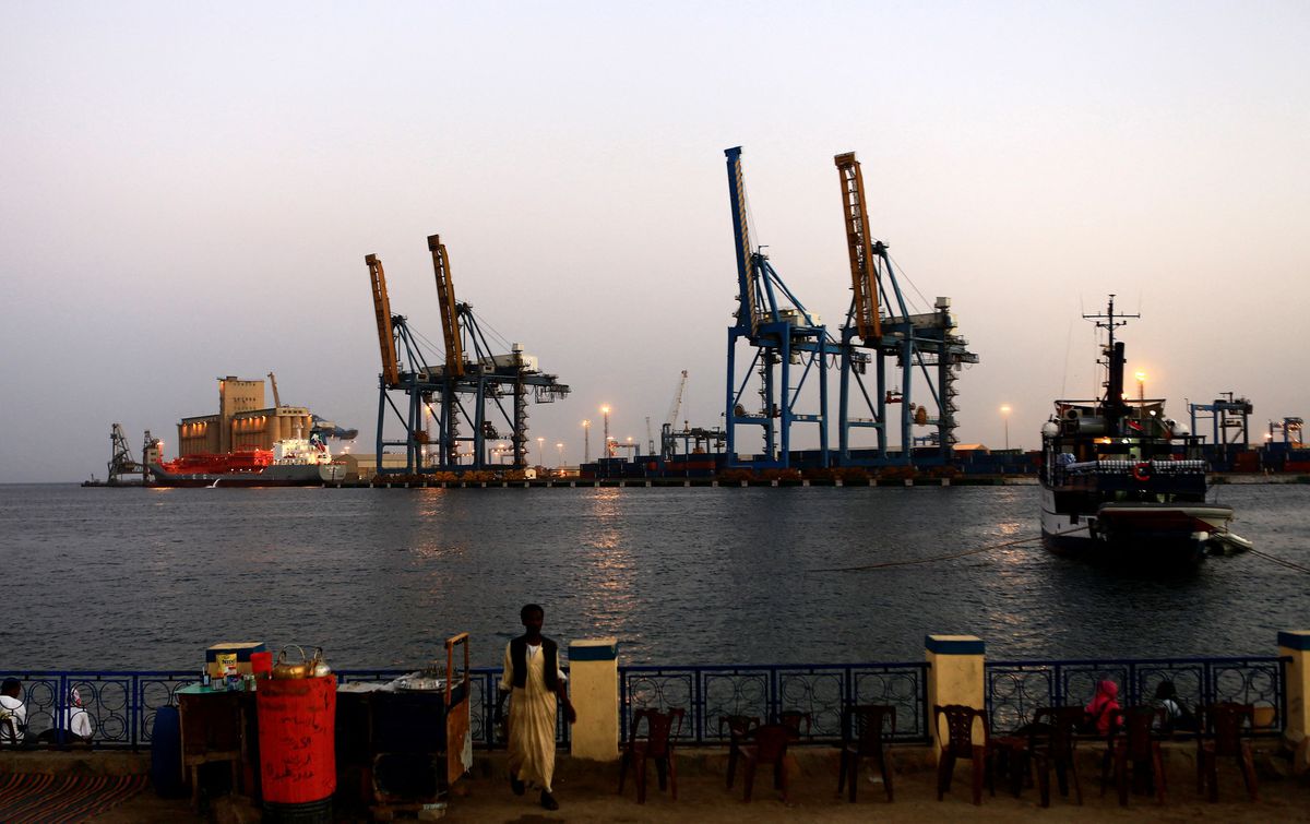 File photo: A man stands opposite the modern port at the harbour in Port Sudan at Red Sea State. (REUTERS/Mohamed Nureldin Abdallah)