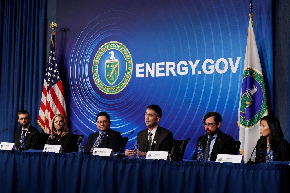 Scientists from the Lawrence Livermore National Laboratories (left - right) Principal Experimentalist Alex Zylstra, Principal Designer Annie Kritcher, Chief Engineer for National Ignition Facility Laser System Jean-Michel Di Nicola, Target Fabrications Program Manager Michael Stadermann, Stagnation Science Team Lead Arthur Pak and Tammy Ma, of the Inertial Fusion Energy Institutional Initiative, speak during a news conference at the Department of Energy headquarters to announce a breakthrough in fusion research on December 13, 2022 in Washington, DC.  Chip Somodevilla/Getty Images/AFP 