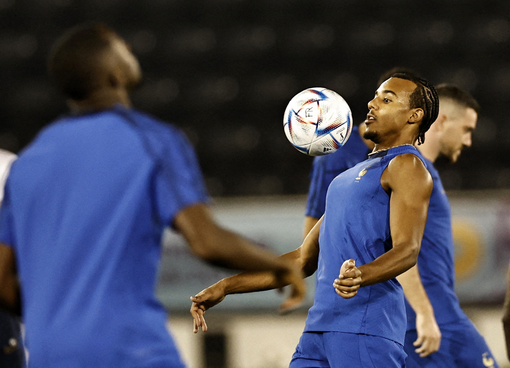 France's Jules Kounde in action during a training session at Al Sadd Sports Club. REUTERS