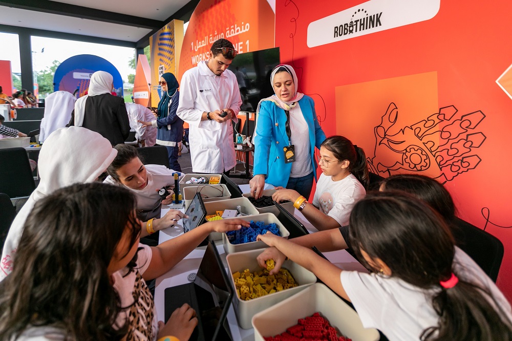 Young people doing experiments during the D’reesha Performing Arts Festival.