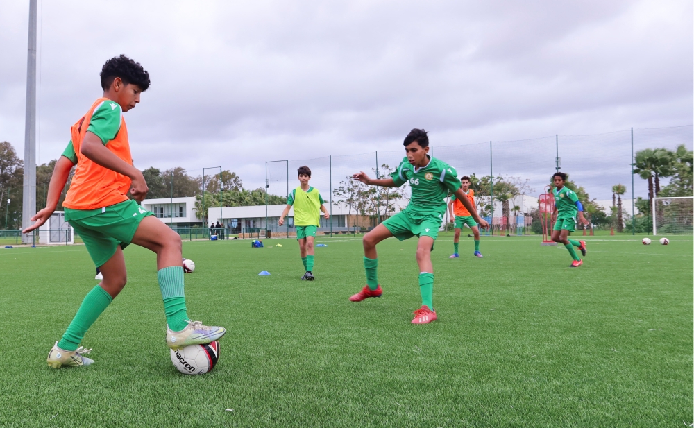 Academy students play soccer during a training session inside Mohammed VI Football Academy near Rabat, Morocco, December 16, 2022. (REUTERS/Jihed Abidellaoui)