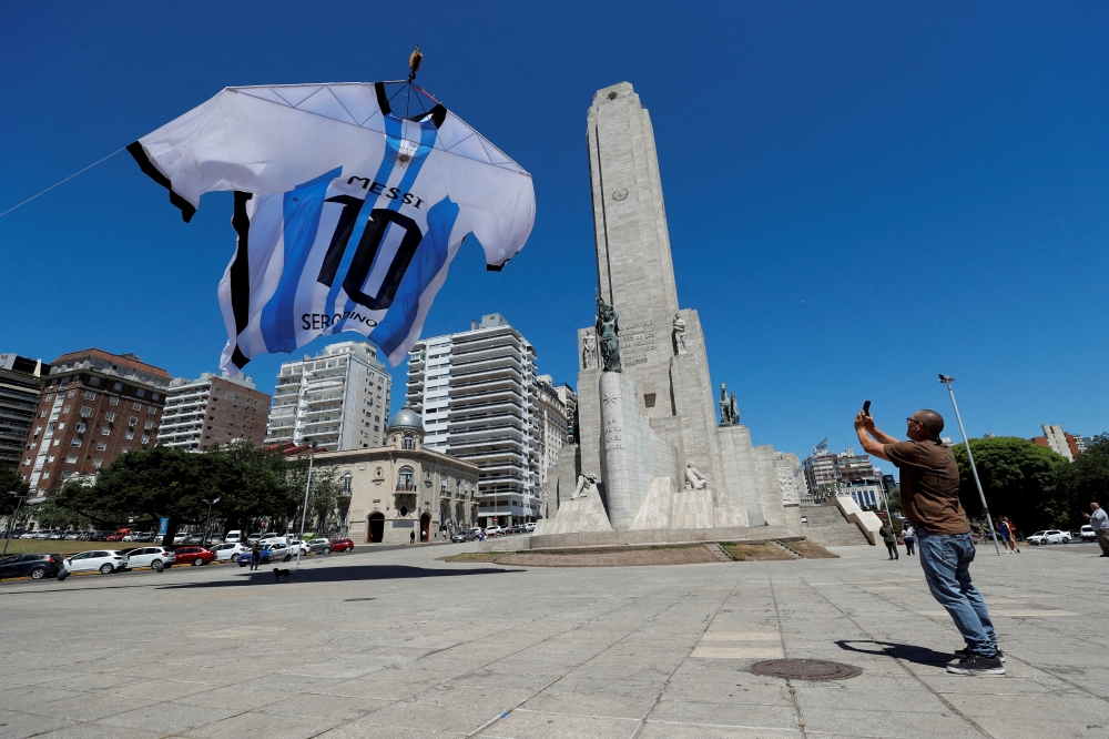 An-18-meter long Argentina shirt featuring soccer star Lionel Messi's surname is displayed at the Monumento a la Bandera (The National Flag Memorial), in Rosario, Argentina, December 16, 2022. REUTERS/Agustin Marcarian 