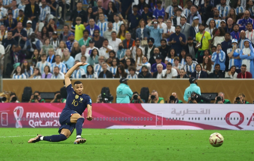 France's Kylian Mbappe scores their second goal during the FIFA World Cup Qatar 2022 final match against Argentina at the Lusail Stadium, Lusail, Qatar, on December 18, 2022.  REUTERS/Carl Recine TPX IMAGES OF THE DAY