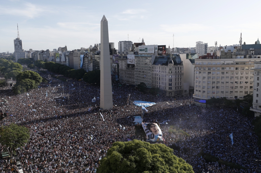 Argentina fans celebrate in Buenos Aires after their team won the World Cup. REUTERS