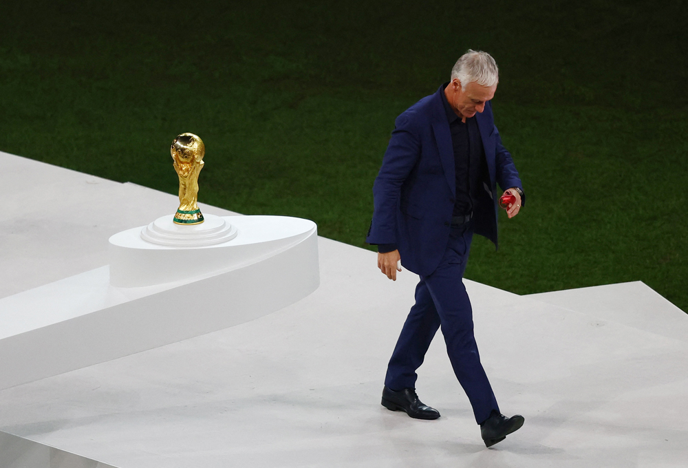 France coach Didier Deschamps walks after receiving the silver medal. REUTERS