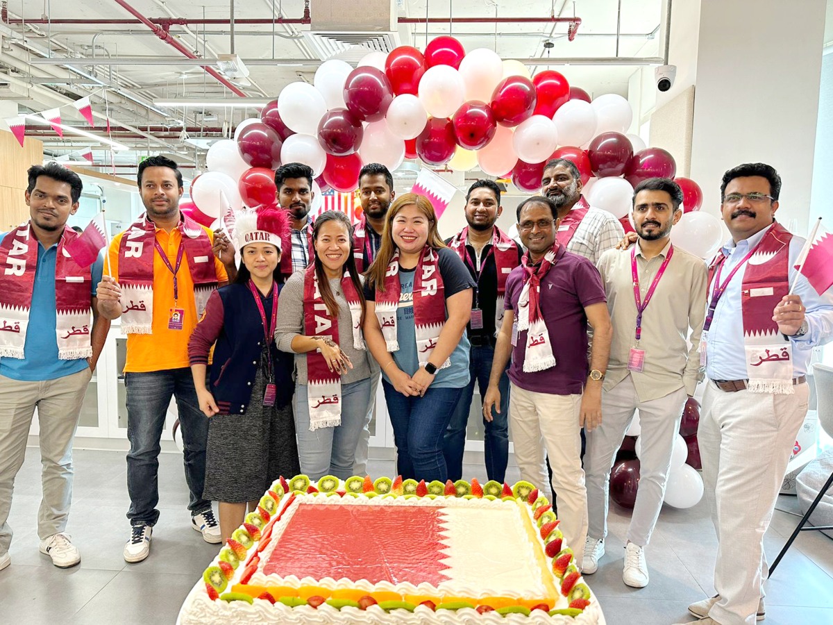 Starlink staff celebrating Qatar National Day at its Lusail office.