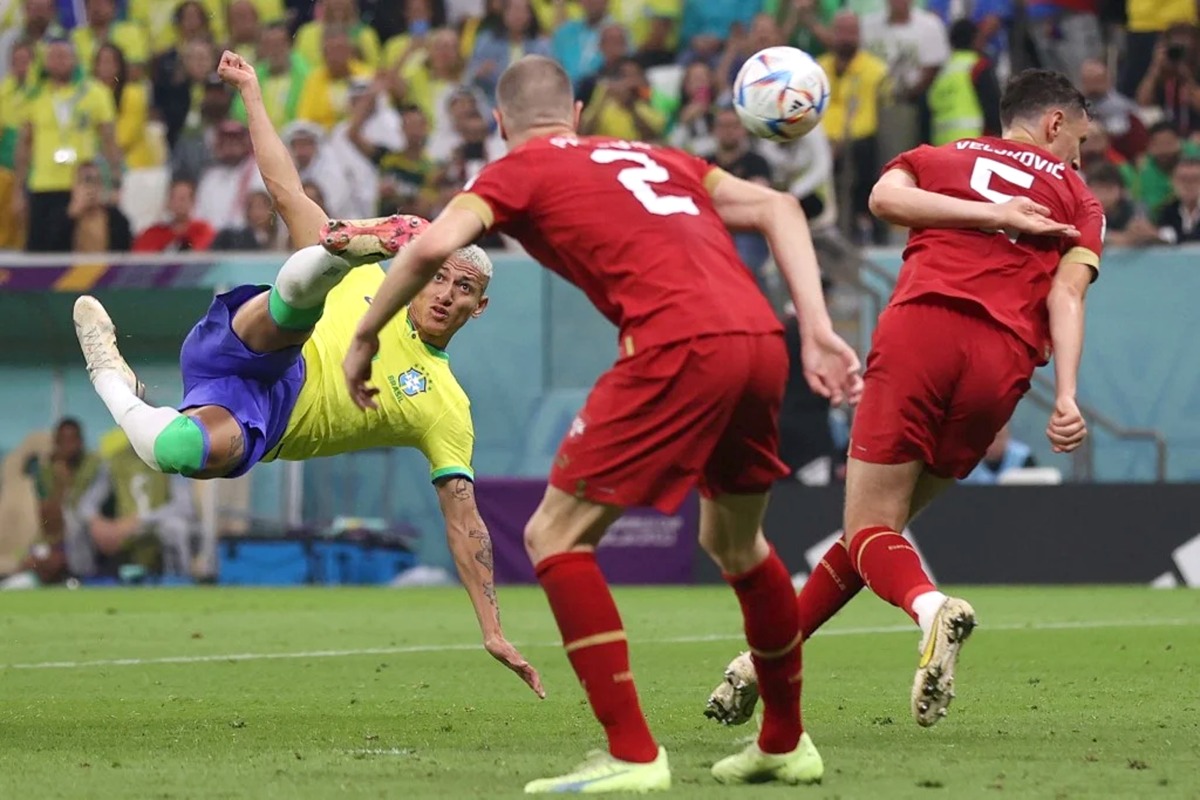 Richarlison (left) scores his second goal during the match between Brazil and Serbia at the Lusail Stadium. AFP