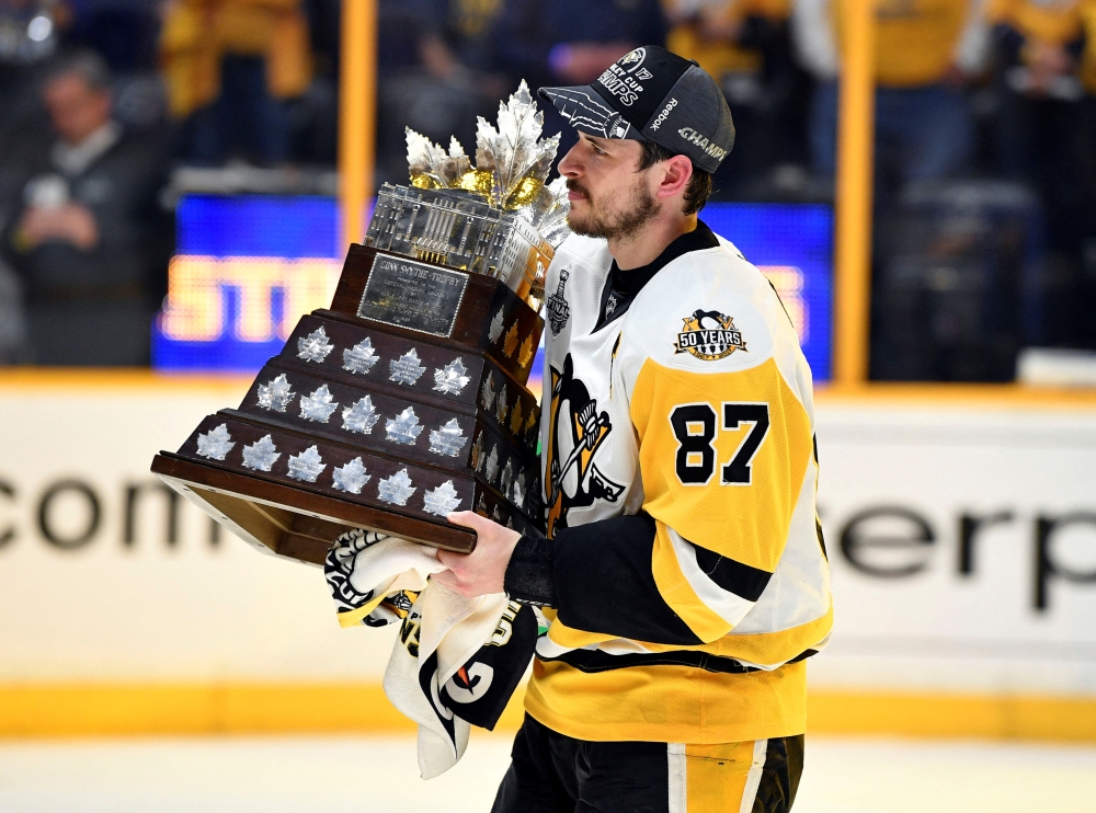 File Photo: Pittsburgh Penguins center Sidney Crosby is presented with the Conn Smythe Trophy after defeating the Nashville Predators in game six of the 2017 Stanley Cup Final at Bridgestone Arena, Nashville, TN, USA, Jun 11, 2017. (Christopher Hanewinckel-USA TODAY / Reuters)