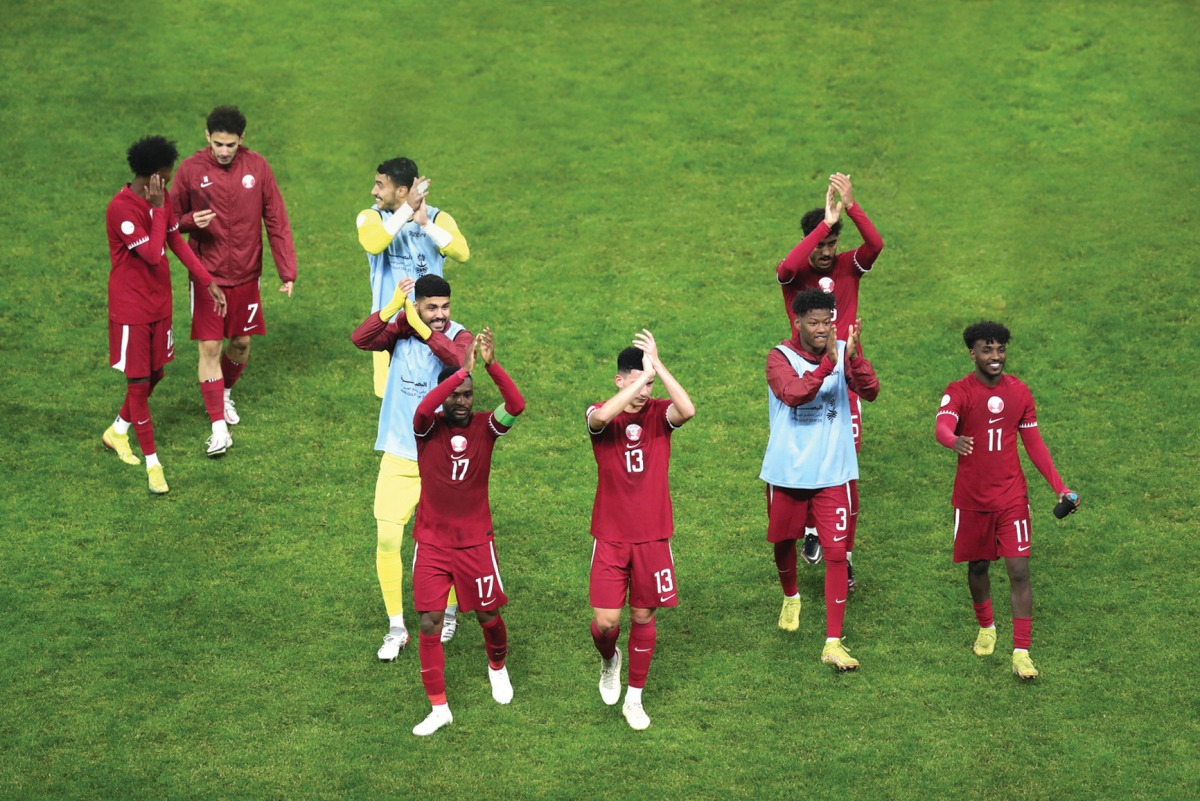 Qatar players acknowledge the crowd after defeating Kuwait in their opening match of the 25th Arabian Gulf Cup in Basra, on Saturday. Pictures: Osama Abdullah Alrosan