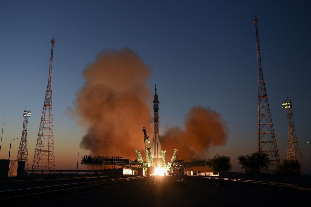 In this file photo taken on September 21, 2022, The Soyuz MS-22 spacecraft carrying the crew of Russian cosmonauts Sergey Prokopyev and Dmitri Petelin and NASA astronaut Frank Rubio blasts off to the International Space Station (ISS) from the Moscow-leased Baikonur cosmodrome in Kazakhstan. (Photo by NATALIA KOLESNIKOVA / AFP)
